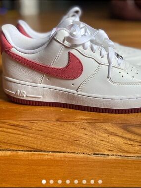 Nike White Low-Top Sneakers with Pink Swoosh
